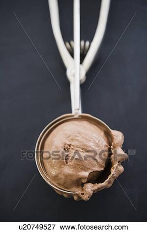Stock Photo - Close up of ice cream scoop. Fotosearch