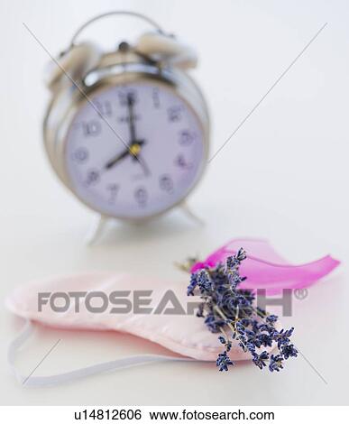 Close up of lavender, alarm clock and sleep masks, studio shot View Large Photo Image Stock Photograph - Close up of lavender, alarm clock and sleep masks, studio shot. Fotosearch