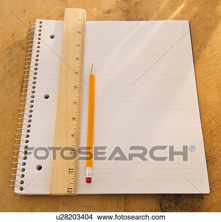 Picture - Close up of notebook, ruler and pencil, studio shot. Fotosearch