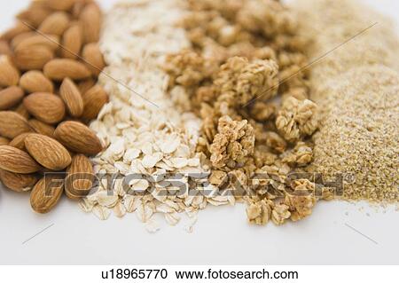 Close up of oats and almonds View Large Photo Image Stock Image - Close up of oats and almonds. Fotosearch