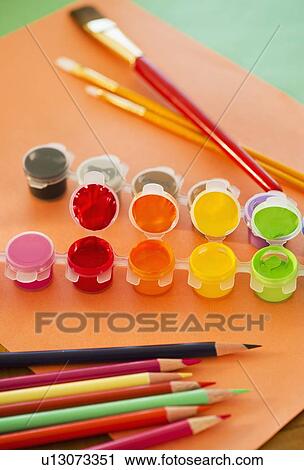 Close up of watercolor paints, crayons and paintbrushes, studio shot View Large Photo Image Stock Image - Close up of watercolor paints, crayons and paintbrushes, studio shot. Fotosearch