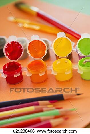Close up of watercolor paints, crayons and paintbrushes, studio shot View Large Photo Image Stock Photograph - Close up of watercolor paints, crayons and paintbrushes, studio shot. Fotosearch