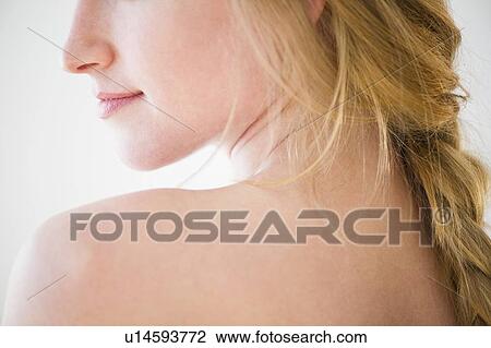 Stock Image - Close-up of woman's shoulder. Fotosearch