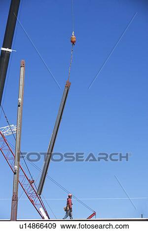 Construction worker on construction frame View Large Photo Image Stock Photo - Construction worker on construction frame. Fotosearch