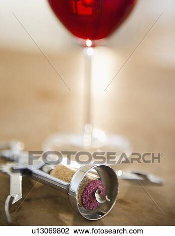 Corkscrew and glass of wine View Large Photo Image Stock Image - Corkscrew and glass of wine. Fotosearch
