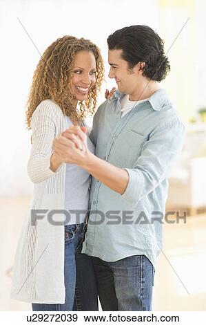 Stock Photo - Couple dancing. Fotosearch