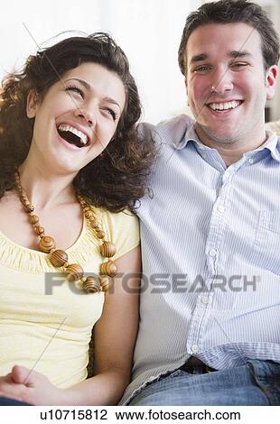 Stock Image - Couple laughing. Fotosearch