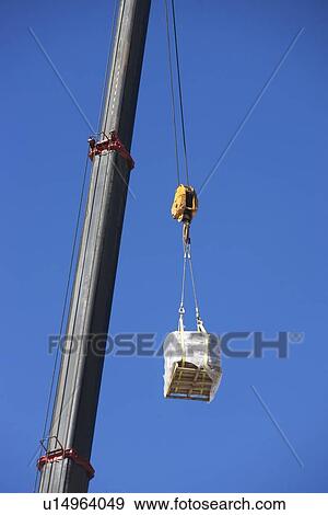 Crane lifting block View Large Photo Image Stock Photo - Crane lifting block. Fotosearch