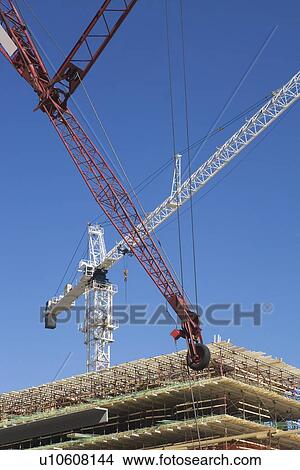 Picture - Crane on construction site. Fotosearch