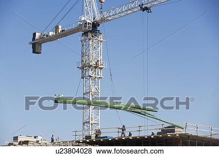 Crane on construction site View Large Photo Image Stock Photo - Crane on construction site. Fotosearch