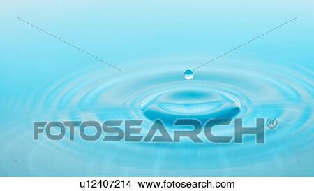 Drop falling into water View Large Photo Image Picture - Drop falling into water. Fotosearch