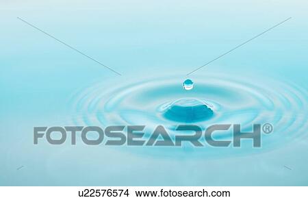Drop falling into water View Large Photo Image Picture - Drop falling into water. Fotosearch