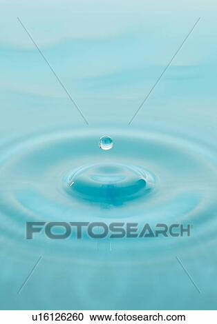 Stock Image - Drop falling into water. Fotosearch