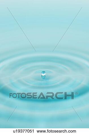 Drop falling into water View Large Photo Image Stock Image - Drop falling into water. Fotosearch