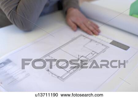 Stock Image - Employee of design agency at work. Fotosearch