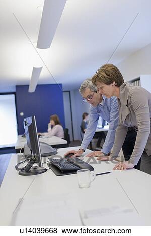 Stock Photo - Employee of design agency at work. Fotosearch