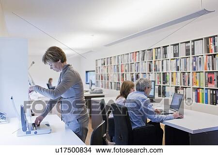 Employees of design agency at work View Large Photo Image Picture - Employees of design agency at work. Fotosearch