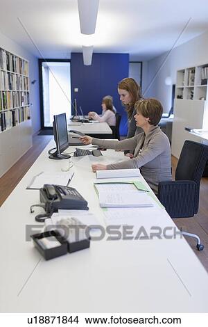 Employees of design agency at work View Large Photo Image Picture - Employees of design agency at work. Fotosearch