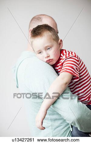Father and toddler boy (2-3) embracing View Large Photo Image Stock Image - Father and toddler boy (2-3) embracing. Fotosearch