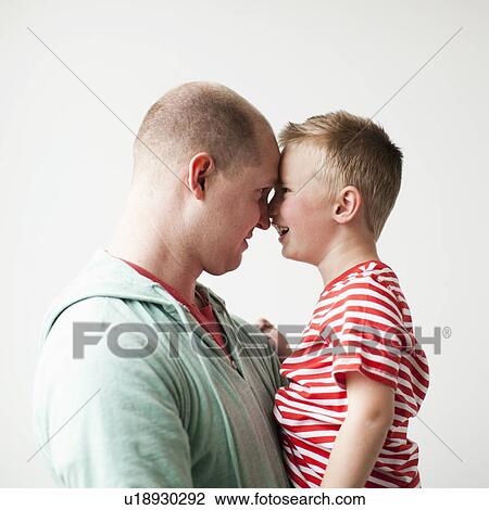 Father and toddler boy (2-3) embracing View Large Photo Image Stock Image - Father and toddler boy (2-3) embracing. Fotosearch