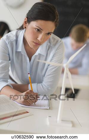 Female student examining wind turbine View Large Photo Image Stock Image - Female student examining wind turbine. Fotosearch