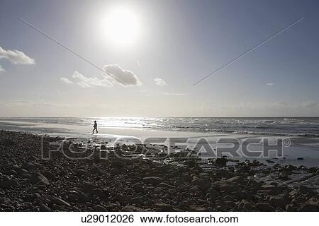 France, Pas-de-Calais, Escalles, Lonely walker on beach View Large Photo Image Stock Photograph - France, Pas-de-Calais, Escalles, Lonely walker on beach. Fotosearch
