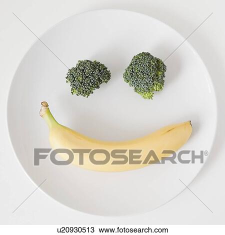 Fruit and vegetable smiling face on plate, studio shot View Large Photo Image Stock Image - Fruit and vegetable smiling face on plate, studio shot. Fotosearch
