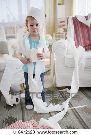 Girl (2-3) wrapped with toilet paper standing in living room View Large Photo Image Stock Image - Girl (2-3) wrapped with toilet paper standing in living room. Fotosearch