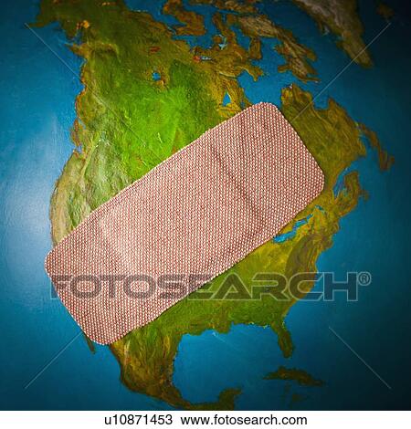 Stock Image - Globe with band-aid . Fotosearch