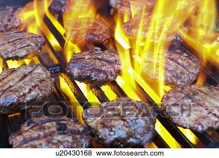 Hamburgers on bbq View Large Photo Image Stock Photo - Hamburgers on bbq. Fotosearch