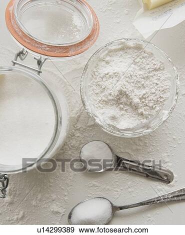 Stock Photo - Jars with flour and sugar. Fotosearch