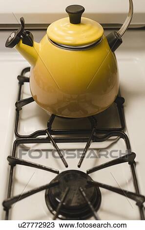 Kettle on stove View Large Photo Image Stock Image - Kettle on stove. Fotosearch