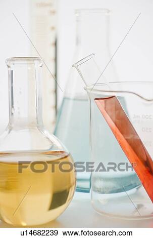 Stock Photo - Laboratory glassware with liquids. Fotosearch
