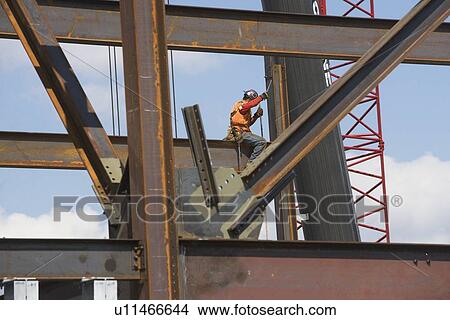 Male worker on construction site View Large Photo Image Picture - Male worker on construction site. Fotosearch