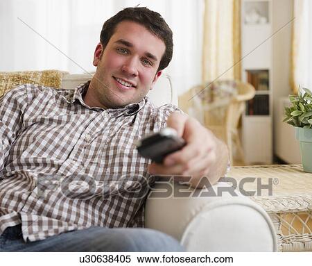 man watching tv View Large Photo Image Stock Photography - man watching tv. Fotosearch