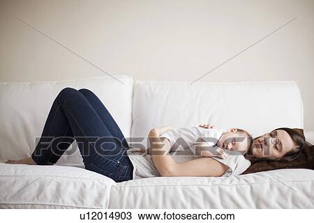 Mother and baby girl (2-5 months) sleeping together View Large Photo Image Stock Image - Mother and baby girl (2-5 months) sleeping together. Fotosearch