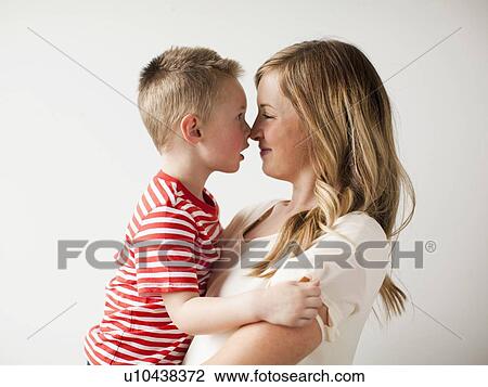 Mother and toddler boy (2-3) embracing View Large Photo Image Stock Image - Mother and toddler boy (2-3) embracing. Fotosearch