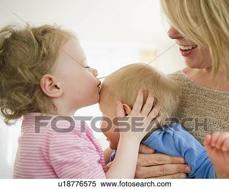 Mother playing with children (2-3, 6-11 months) View Large Photo Image Stock Photography - Mother playing with children (2-3, 6-11 months). Fotosearch