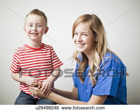 Mother talking to toddler boy (2-3) View Large Photo Image Stock Photo - Mother talking to toddler boy (2-3) . Fotosearch