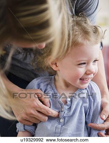 Mother tickling daughter (2-3) View Large Photo Image Stock Image - Mother tickling daughter (2-3). Fotosearch
