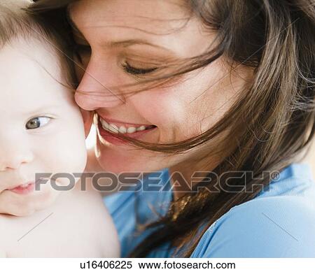Mother with baby daughter (6-11 months) View Large Photo Image Stock Photography - Mother with baby daughter (6-11 months). Fotosearch
