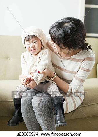 Mother with baby girl (12-17 months) View Large Photo Image Picture - Mother with baby girl (12-17 months). Fotosearch