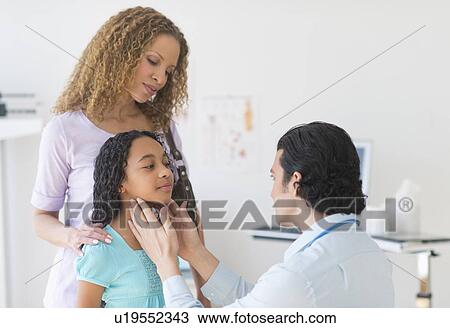 Mother with daughter (12-13) visiting pediatrician View Large Photo Image Stock Image - Mother with daughter (12-13) visiting pediatrician. Fotosearch
