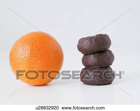 Orange and chocolate cookies on white background, studio shot View Large Photo Image Stock Image - Orange and chocolate cookies on white background, studio shot. Fotosearch