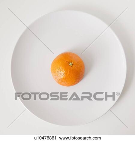 Orange on plate, studio shot View Large Photo Image Stock Image - Orange on plate, studio shot. Fotosearch