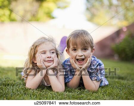 Outdoor portrait of girl (4-5) and boy (6-7) View Large Photo Image Stock Image - Outdoor portrait of girl (4-5) and boy (6-7) . Fotosearch