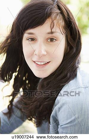Outdoor portrait of happy young woman View Large Photo Image Picture - Outdoor portrait of happy young woman. Fotosearch