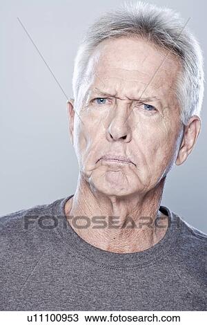 Portrait of angry senior man, studio shot View Large Photo Image Stock Image - Portrait of angry senior man, studio shot. Fotosearch