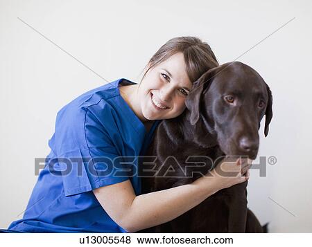 Portrait of attractive young and her dog View Large Photo Image Stock Photo - Portrait of attractive young and her dog. Fotosearch