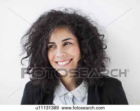 Stock Photo - Portrait of beautiful young woman. Fotosearch
